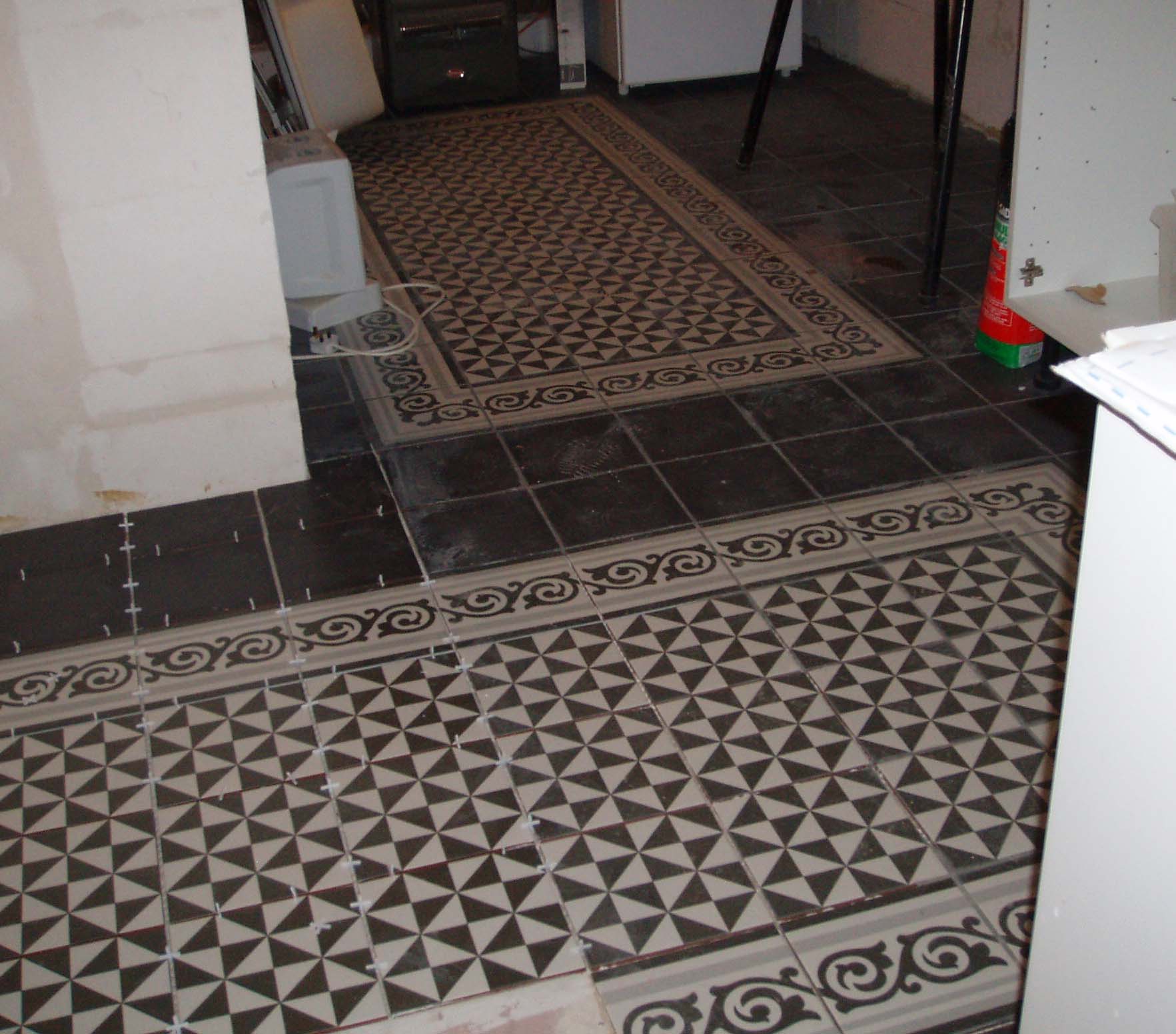 Image of more floor tiles laid